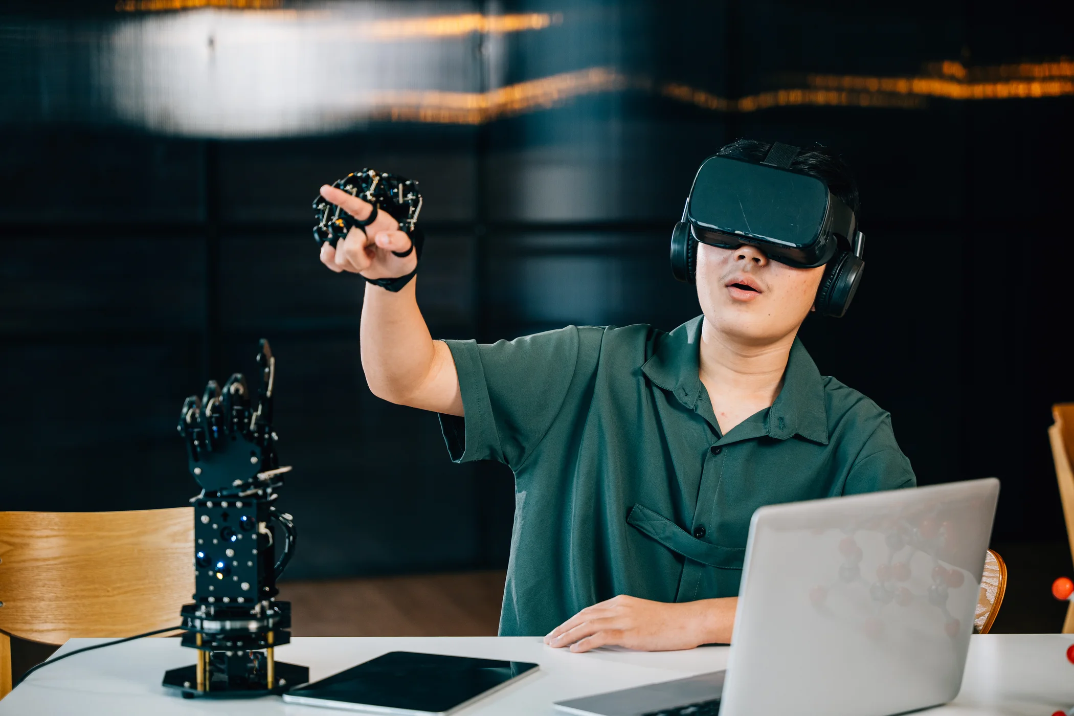 Developer testing an immersive headset and robotic controls