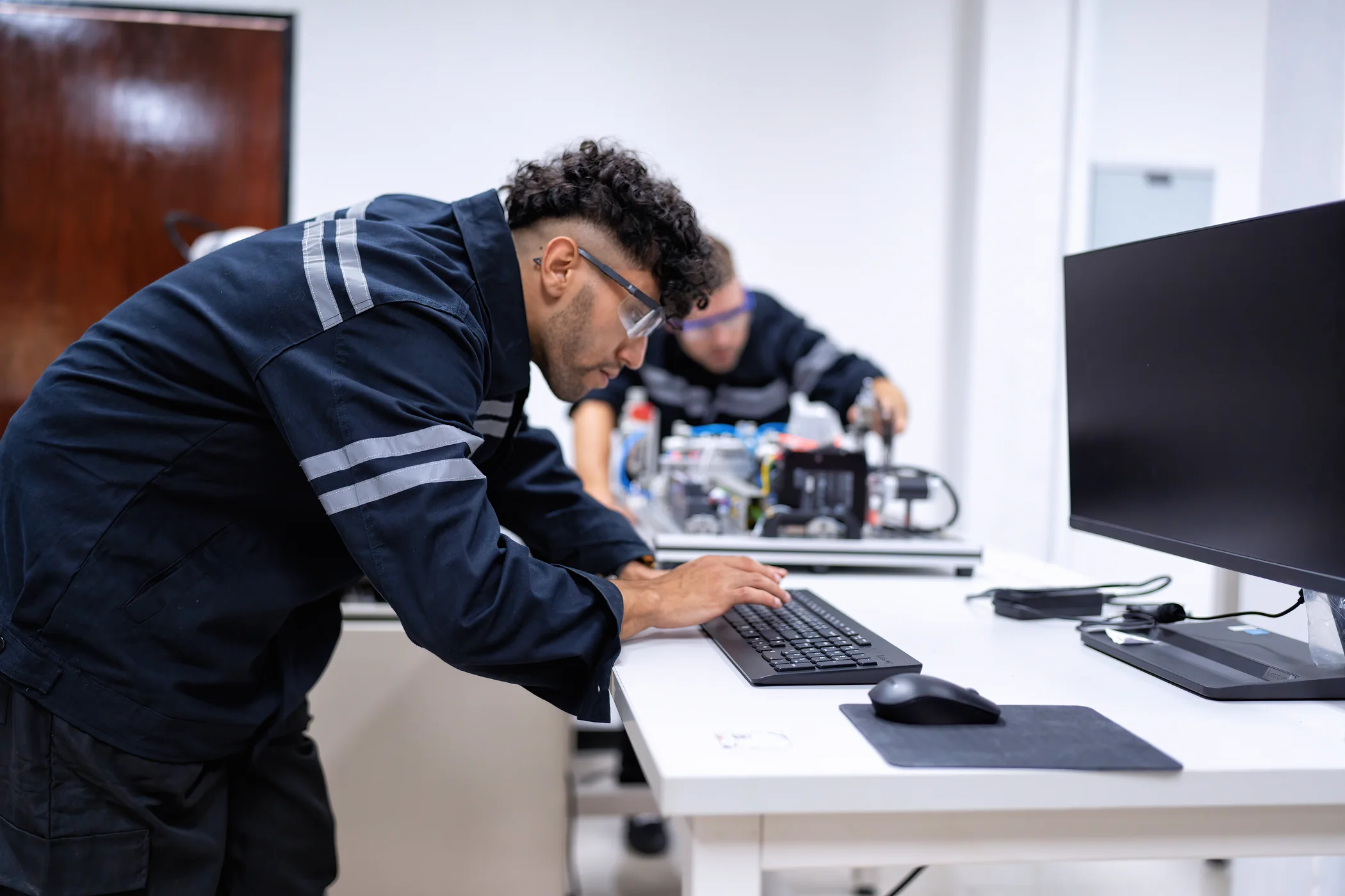 Engineers commissioning a robotic system
